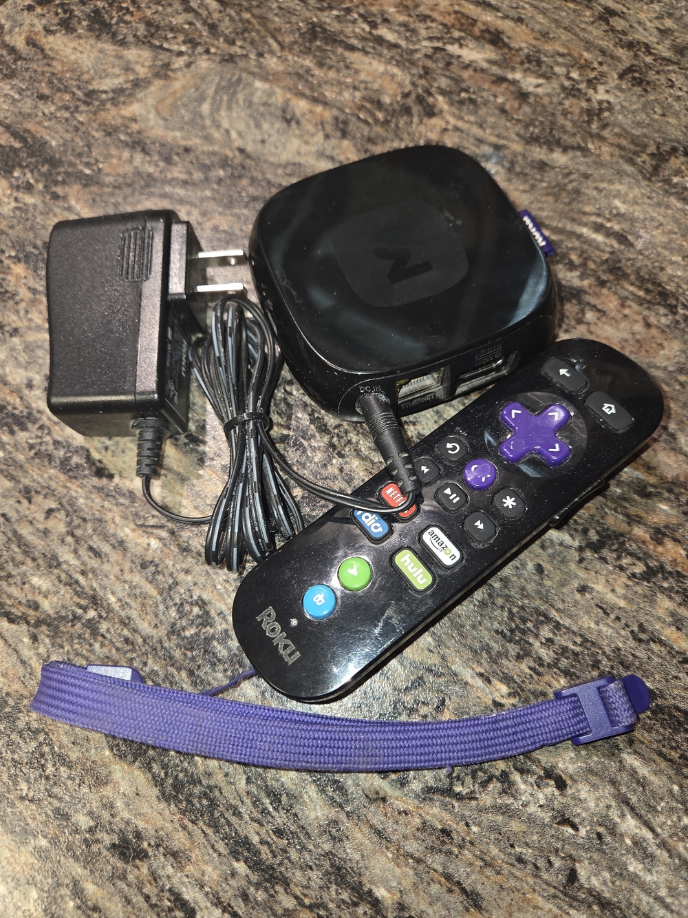 Roku Streaming Media Player with Black Unit and Purple-Accented Remote